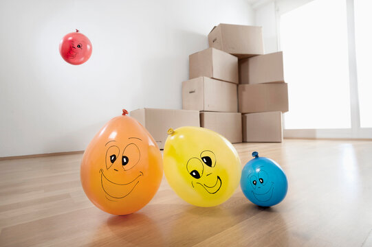 Balloons representing family moved to new apartment, Bavaria, Germany