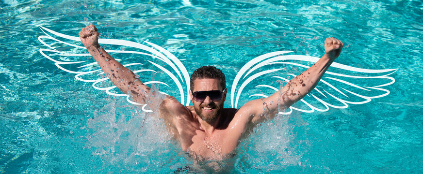 Photo banner of sexy man angel with wings for valentines day. Pool resort. Happy man in swimming pool. Summer vacation. Man in sunglasses relaxing in swimming pool.