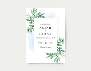 Wedding invitation card with green leaves