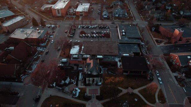 beautiful drone shot of The Cook Memorial Library also known as the Ansel B. Cook House, is a historic house museum in Libertyville, Illinois, United States. Sunset Aerial 4k