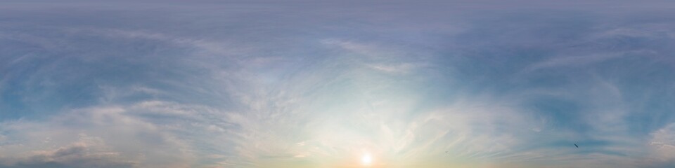 Obraz premium Dark blue sunset sky panorama with golden Cirrus clouds. Seamless hdr 360 panorama in spherical equirectangular format. Full zenith for 3D visualization, sky replacement for aerial drone panoramas.
