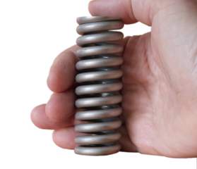 Aluminum spring in the human hand.