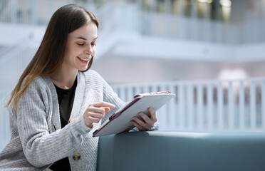 University, happy or woman in library on tablet for research, education or learning. Mockup, student or girl on tech for scholarship communication, search or planning school project at collage campus