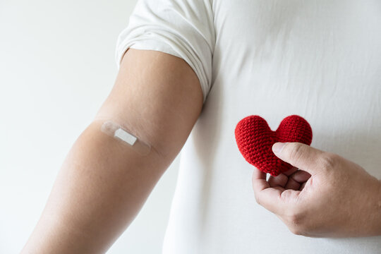 Concept Of Man With Plaster Giving Blood Donation To Save Patient Life, Medical Emergency Treatment