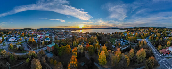 Fototapeta premium Autumn view of Ludvika town and Väsman lake in Sweden at sunset.