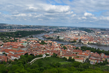Naklejka na ściany i meble Old town of Prague. Czech Republic over river Vltava with Charles Bridge on skyline. Prague panorama landscape view with red roofs.