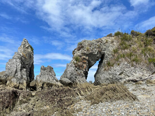 Natural rock arch, Mangawhai Cliff walk, Auckland, New Zealand.
