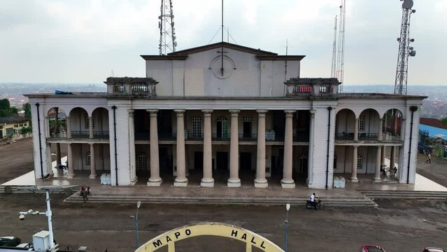Static wide shot of a colonial-style building in Nigeria