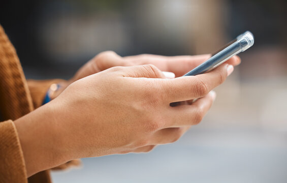 Hands, cellphone and woman in city typing on social network, internet search and mobile gps for travel. Urban app, closeup and smartphone technology for 5g online connection, web post or notification - Powered by Adobe