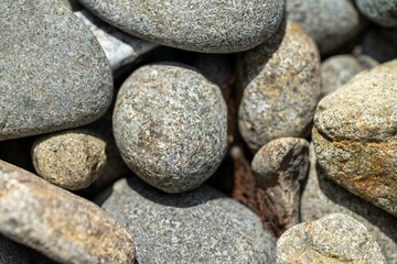 Fototapeta na wymiar pebbles on a beach in tasmania australia