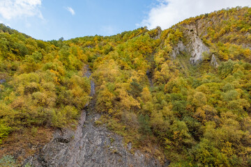 Fototapeta premium Highlands of North Ossetia. Mountains of the Caucasus. High mountains in the rays of the setting sun.