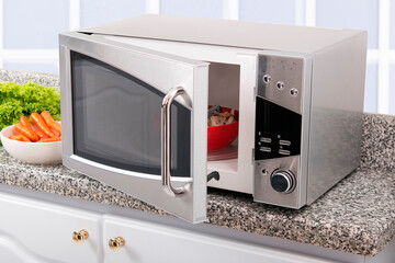 Fototapeta premium Microwave oven; photo in kitchen environment.