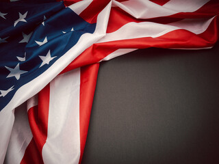 Part of the American flag is on a black background
