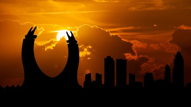 Qatar Skyline with the Lusail City Iconic Development, Time Lapse at Sunset with Red Sun and Fiery Sky