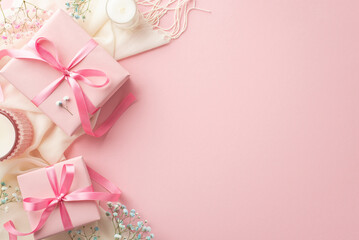 Spring romantic concept. Top view photo of pink gift boxes with bows white soft scarf candles and gypsophila flowers on isolated pastel pink background with copyspace