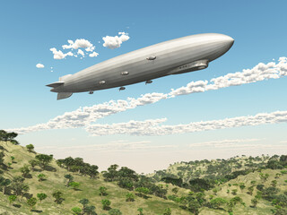 Fototapeta premium Zeppelin über einer Landschaft