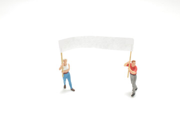 a mini figure hold the empty blank board