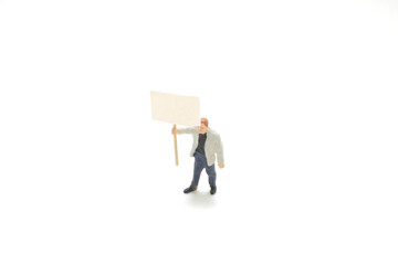 a mini figure hold the empty blank board