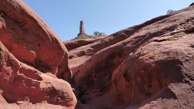 SLO MO walking up to moab castleton tower on a bright day