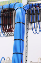 Connection of blocks and modules with an insulated wire on the reverse side of the electrical switchboard. Fastening with plastic mounting ties.