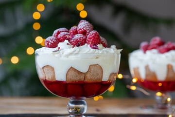 Raspberry trifle with fruit jelly, custard and cream