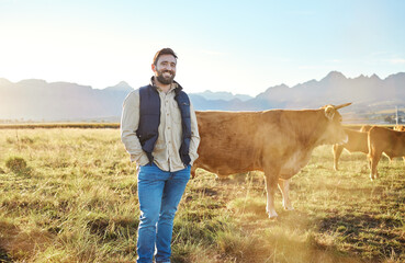 Sustainability, farming and portrait of farmer with cows on field, happy man in countryside with...