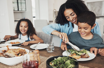 Mom, children and eating food in home together for lunch, dinner table and healthy meal. Happy...
