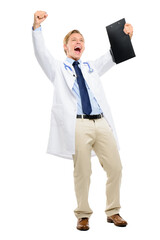 An overjoyed doctor or a medical student expressing his happiness by raising both his hands in the air and holding a clipboard while celebrating isolated on a PNG background.