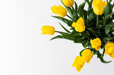 Beautiful spring bouquet of yellow tulips, top view of the bouquet