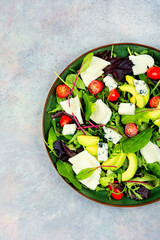 Fresh vegetable salad with cheese