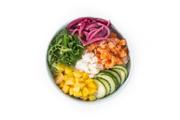 Poke bowl with rice, salmon,cucumber,mango,onion,wakame salad, poppy seeds ands sunflowers seeds isolated on white background. Top view