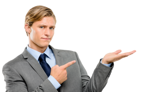 A serious young business manager pointing at a product in his hand and recommending it in copy space isolated on a png background.