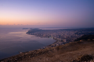 Attractive spring cityscape of Vlore city from Kanines fortress. Captivating morning sescape of Adriatic sea. Spectacular outdoor scene of Albania, Europe. Traveling concept background.