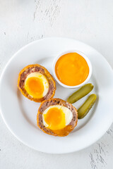 Portion of Scotch egg