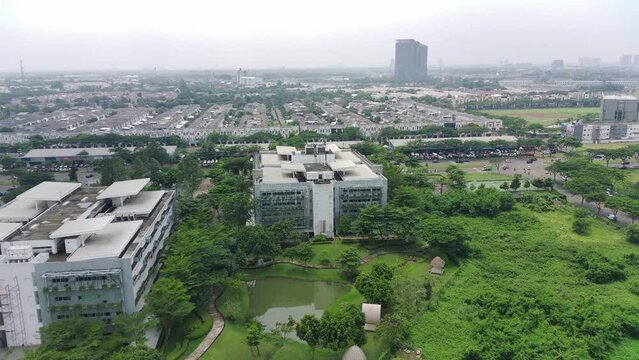 4K footage aerial view of shophouses and roads in BSD Tangerang, Indonesia.