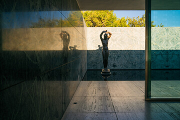 The Modern Barcelona Pavilion from the pool angle in the evening - obrazy, fototapety, plakaty