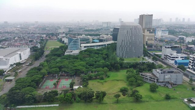 4K footage aerial view of shophouses and roads in BSD Tangerang, Indonesia.