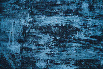 Rough cracked paint dark flat background.