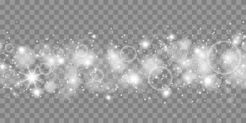 White sparks and stars glitter special light effect. Christmas abstract pattern. Sparkling magic dust particles.