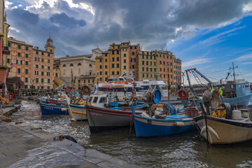 Obraz premium CAMOGLI, ITALY, JANUARY 18, 2023 - View of the marina of Camogli in a cloudy day, Genoa province, Italy.