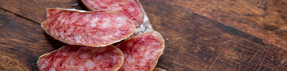 sausage Fuet fresh cured meat product meal food snack on the table copy space food background rustic top view