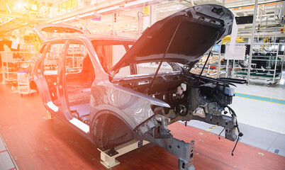 Photo of a car production line. Modern car assembly plant.