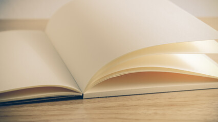 Recycled paper book on wooden background