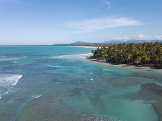 Fototapeta na wymiar Big caribbean beach Esmeralda Miches Dominican Republic birds view