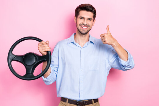 Photo of satisfied nice man raise hand thumb up enjoy repaired service new speed car isolated on pink color background