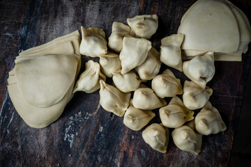 Uncooked local food of Bangladesh called singhara made with bread and potatoes , close up image of popular native food of india 