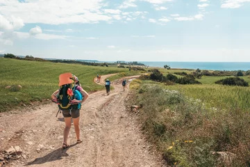  A group of backpackers walk to Lara Beach in Cyprus © Andrii Marushchynets