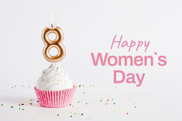 Happy International Womens Day greeting card with cupcake with candle with the number 8