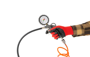 Manometer for car tyre pressure setting in the hand of a worker, cut out