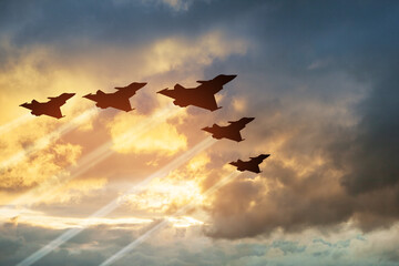 Air Force Day. Aircraft silhouettes on background of sunset or sunrise.